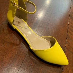 Bright yellow flats, never worn